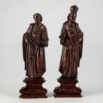 null Pair of statuettes of saints in carved wood on a pedestal.

H. 21,5 cm

Small...