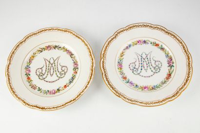 null After the Manufacture de SEVRES

Pair of enameled porcelain plates with central...