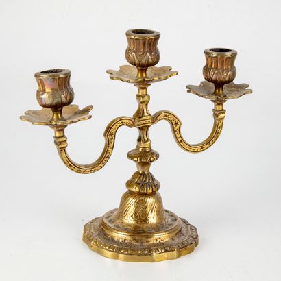 null Candlestick with three arms of light in gilt bronze. 

H. 20 cm