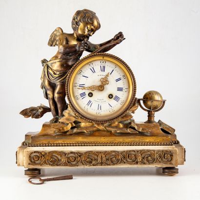 null Chased and gilded bronze clock decorated with a love adorned with the attributes...
