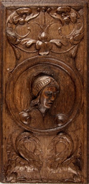 null Carved wooden panel decorated with a medallion with a soldier's portrait, carved...