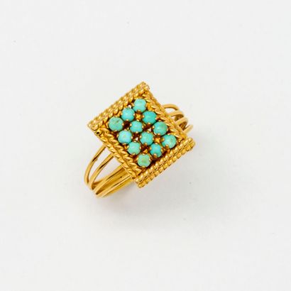 null Gold ring decorated with turquoise stones

Gross weight : 5,3 g.