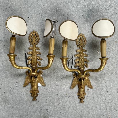 null Pair of ormolu sconces with two arms of light, finely chiseled decoration of...
