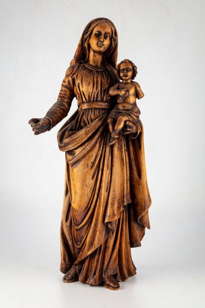 null Important statuette of the Virgin and Child in carved wood. 

H. 58 cm 

Mi...