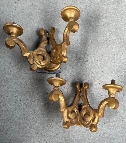 null Pair of sconces with two arms of light in wood and gilded stucco. Louis XV style...