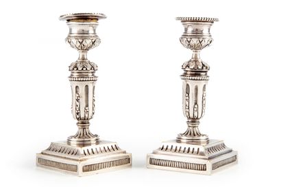 null Pair of candlesticks of toilet with square section out of silver plated bronze....