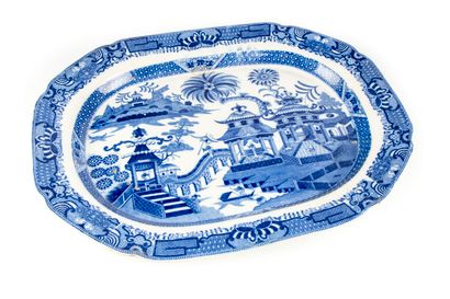 null 
Two large fine earthenware dishes decorated in blue with Chinese landscape....