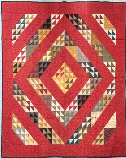 null Couverture patchwork-Quilt à motifs sur fond rouge d'encadrements losangiques...