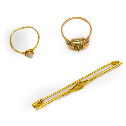 null Lot including a gold brooch and a small ring with an opal, and a small yellow...