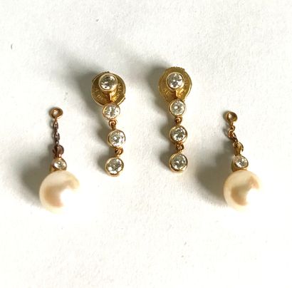 Pair of gold earrings set with a small diamond,...