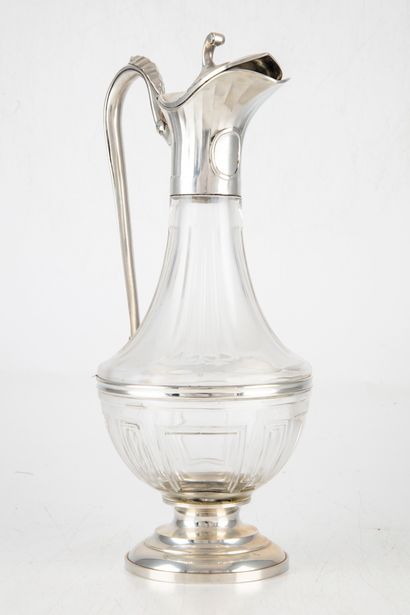 null Glass and pewter ewer. 
H. 32 cm