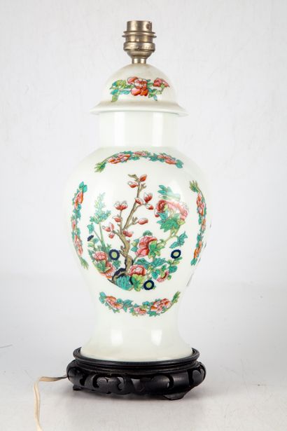 null Vase in trompe l'oeil in polychrome enamelled porcelain decorated with flowers,...