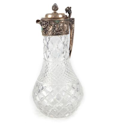 null Cut crystal ewer, silver plated metal frame with Renaissance style decoration...