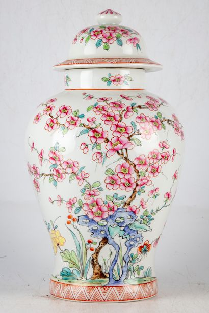 null Covered porcelain vase enamelled with polychrome decoration of crisiers in flowers....