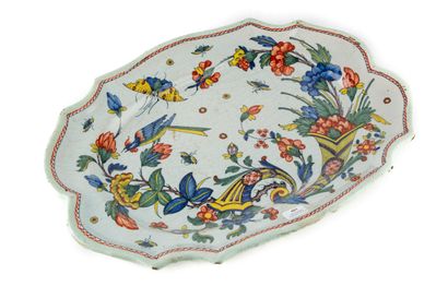 null ROUEN
Earthenware dish decorated with butterflies, birds and horns of plenty...