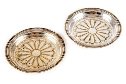 null CHRISTOFLE 
Pair of silver plated metal coasters with pearl frieze decoration....