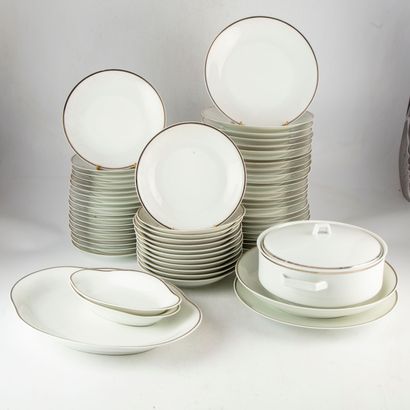 null CHASTAGNER - LIMOGES 
Enameled porcelain dinner service with a silver net decoration...