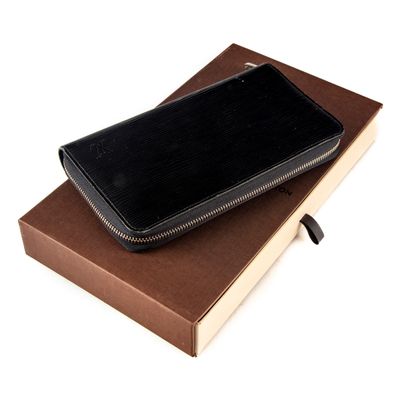 VUITTON Louis VUITTON 
Black epis leather wallet, "Zippy Organizer" model 
With its...