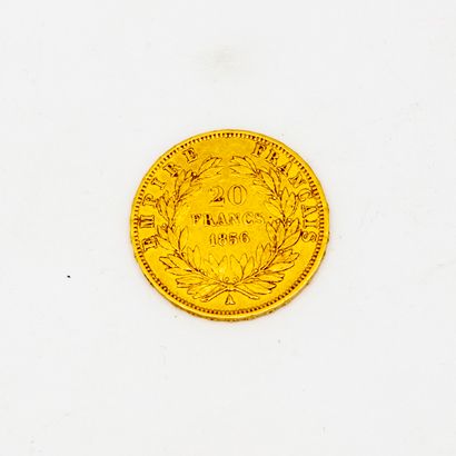 null 1 pièce de 20 francs or datée 1871
Poids : 6,4 g.