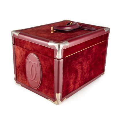 CARTIER Must of CARTIER 
Bordeaux leather and suede vanity case, monogrammed on the...