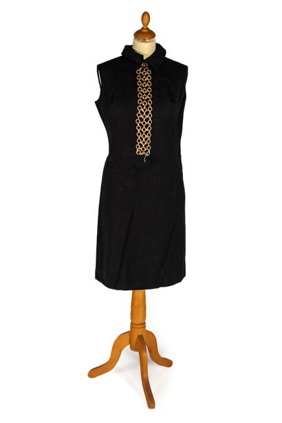 LANVIN LANVIN 
Black wool dress with a golden metal chain 
In its original cardboard...