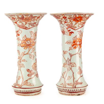 null JAPAN 
Pair of glazed earthenware vases decorated with flowers in red on a white...