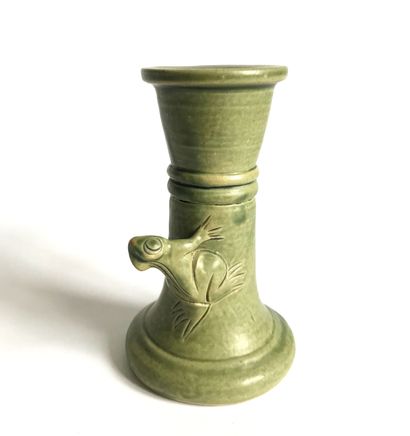 null CHINA
Celadon ceramic candlestick with a cylindrical shaft decorated with a...
