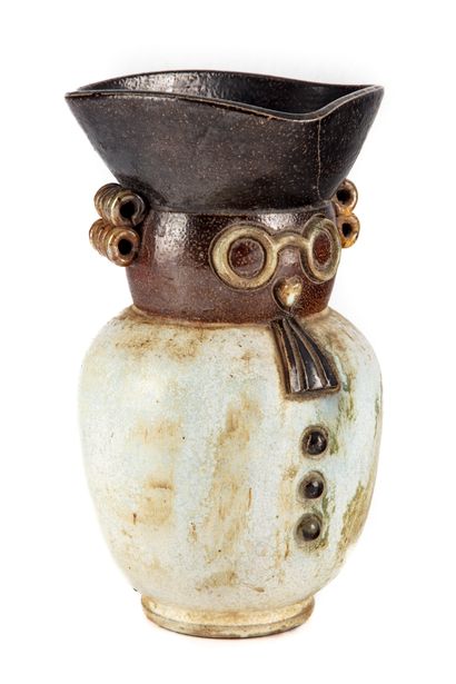 null Anthropomorphic pitcher in enamelled stoneware 
H. 23 cm
The neck glued bac...