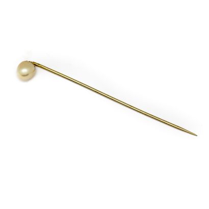 null Epingle de cravate en or ornée d'une perle
Poids brut : 1,6 g.