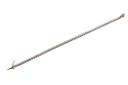 Bracelet ligne en or gris (750/1000) orné...
