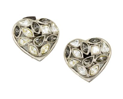 null YVES SAINT LAURENT
Pair of silver plated metal and rhinestone heart shaped ear...