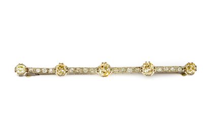 null Diamond-paved white gold barrette brooch set with five cognac-colored old-cut...