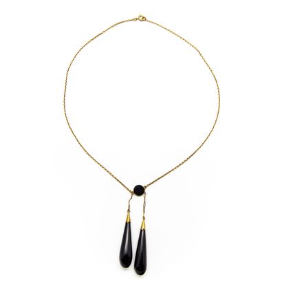 null Negligee necklace in yellow gold adorned with jet pendants
Gross weight: 12.5...
