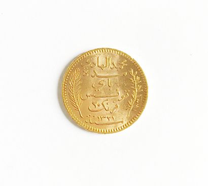 null Une pièce de 20 francs or Tunisie - Muhammad IV - 1903
Poids : 6,45 g
Dans son...
