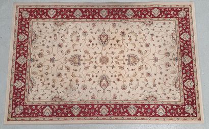 null Mechanical carpet decorated with palmettes on beige fields in the style of Agra....