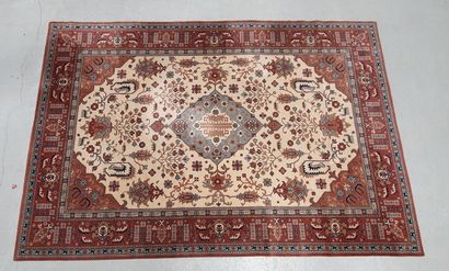 null Mechanical carpet of Persian style with central motive of flowers on beige fields,...