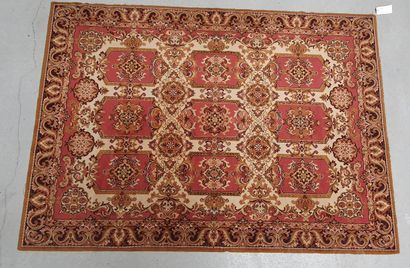 null Mechanical carpet with central medallions on beige fields. Border with frieze...