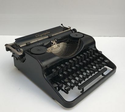 null OLYMPIA - Vintage
Machine à écrire en métal