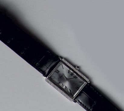 PIAGET Bracelet montre en or gris, modèle 9212, lunette rectangulaire enserrée par...