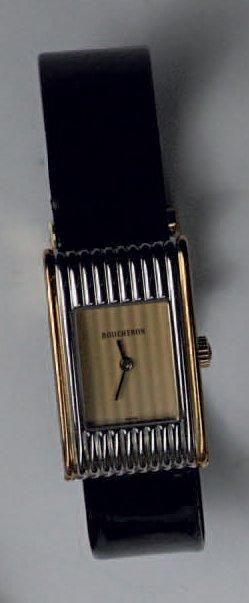 BOUCHERON Bracelet montre en acier et or (4 bracelets) dans son écrin d'origine....