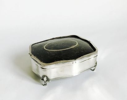 null Small silver box with tortoiseshell-style lid. It stands on four small fleur-de-lis...