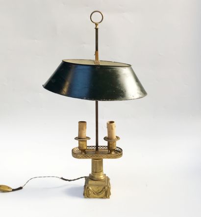 null Small two-light hot-water bottle lamp in molded and chased bronze. Sheet metal...