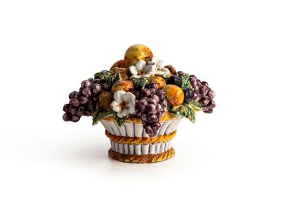 null Centerpiece decorated with a basket of fruit and flowers, 20th century
Glazed...