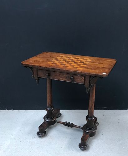 null Rectangular game table with veneered top centered on a checkerboard. It opens...