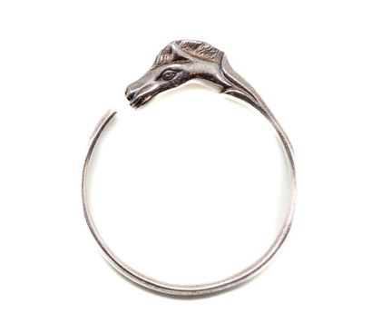 null HERMES - Paris
Silver bangle bracelet ending in a horse's head
Signed - M.O.:...