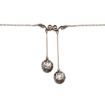 null Negligee necklace in white gold adorned with two 0.30 ct diamonds on a white...