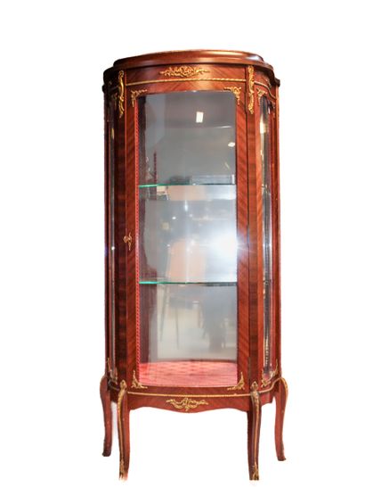 null Veneered display case opening with a glass door, decorated with gilded bronzes,...
