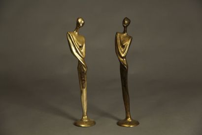 Deux femmes. Sculpture en laiton. H. : 40...