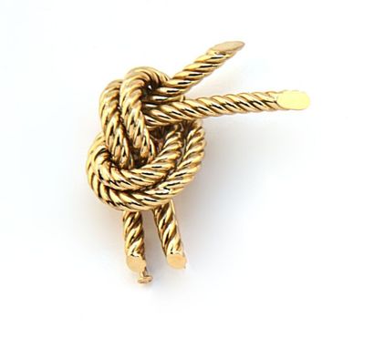 Broche en forme de noeud de marine en or...