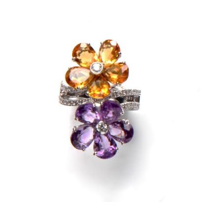 null Bague double fleurs ornée de citrines et d'améthystes ponctuées de diamants

Poids...